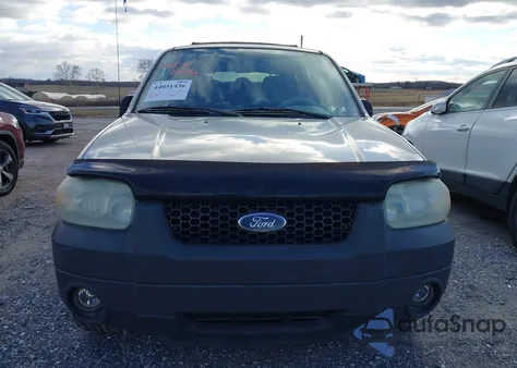 2005 Ford Escape Xlt z USA, uszkodzony, nr VIN 1FMYU93115KB75462